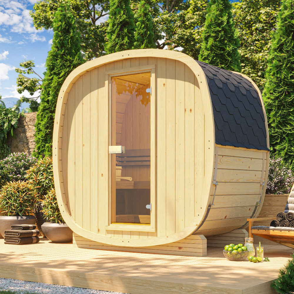 Wooden sauna pod in a garden setting with greenery and outdoor furniture.